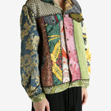 Green jacket worn by a person, showing the jacket‘s fit