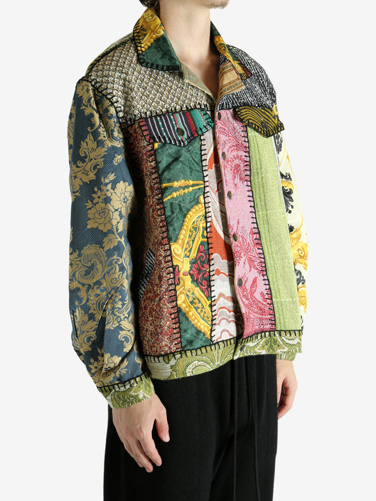 Green jacket worn by a person, showing the jacket‘s fit