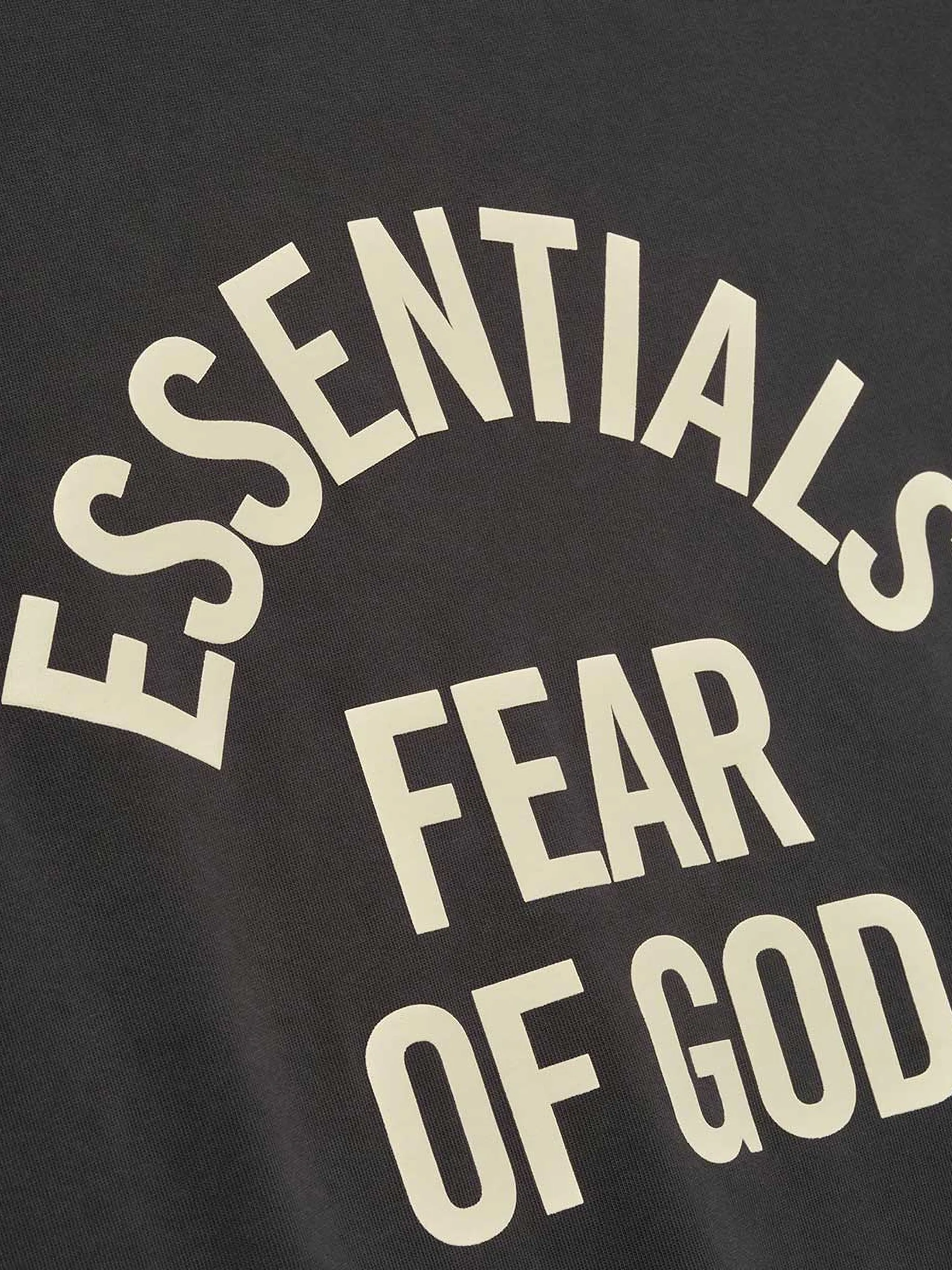 Close up of black t-shirt, showing texture of the Cotton fabric