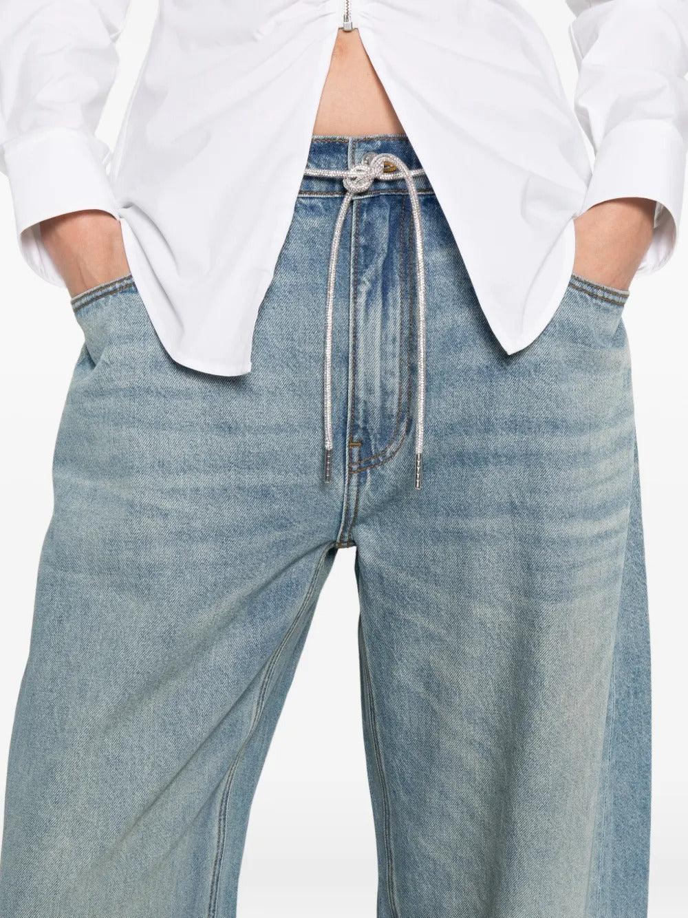 Cloes-up of blue jeans, showing texture of cotton fabric