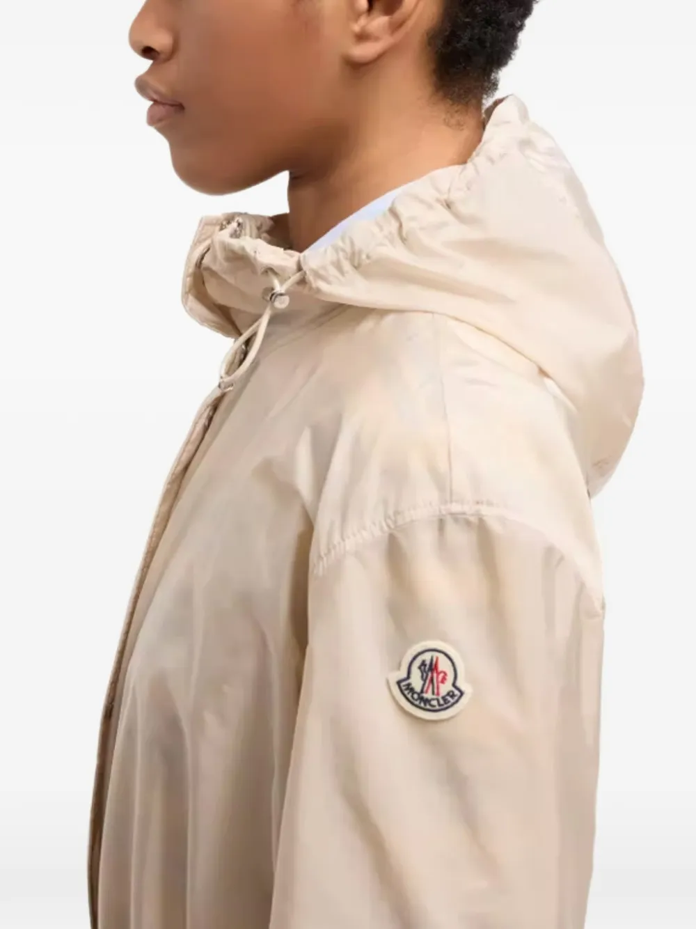 Close up of tan jackets-coat, showing texture of the polyamide fabric