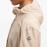 Close up of tan jackets-coat, showing texture of the polyamide fabric