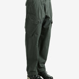 Green pants worn by a person, showing the pants fit