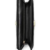 Close up of black bag, showing texture of the leather fabric