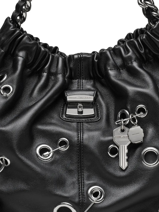 Close up of black bag, showing texture of the Cow Leather fabric