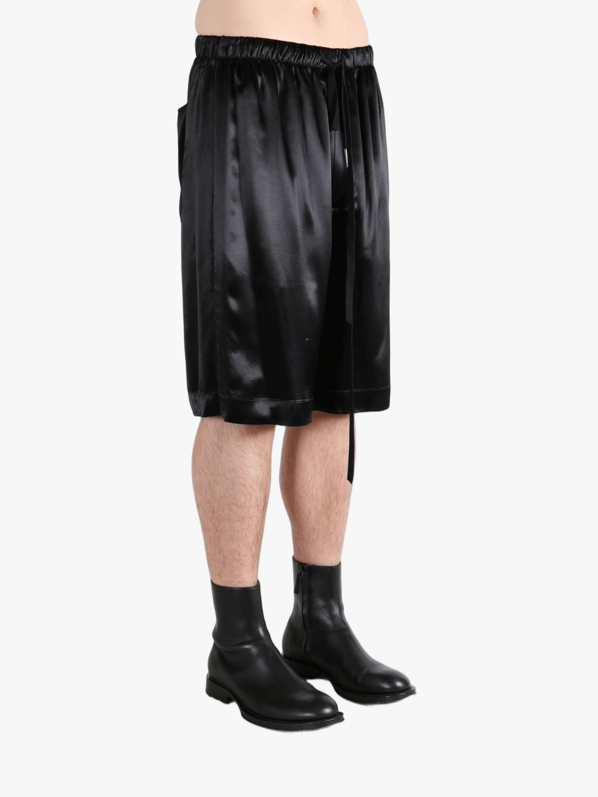 Black short worn by a person, showing the short fit