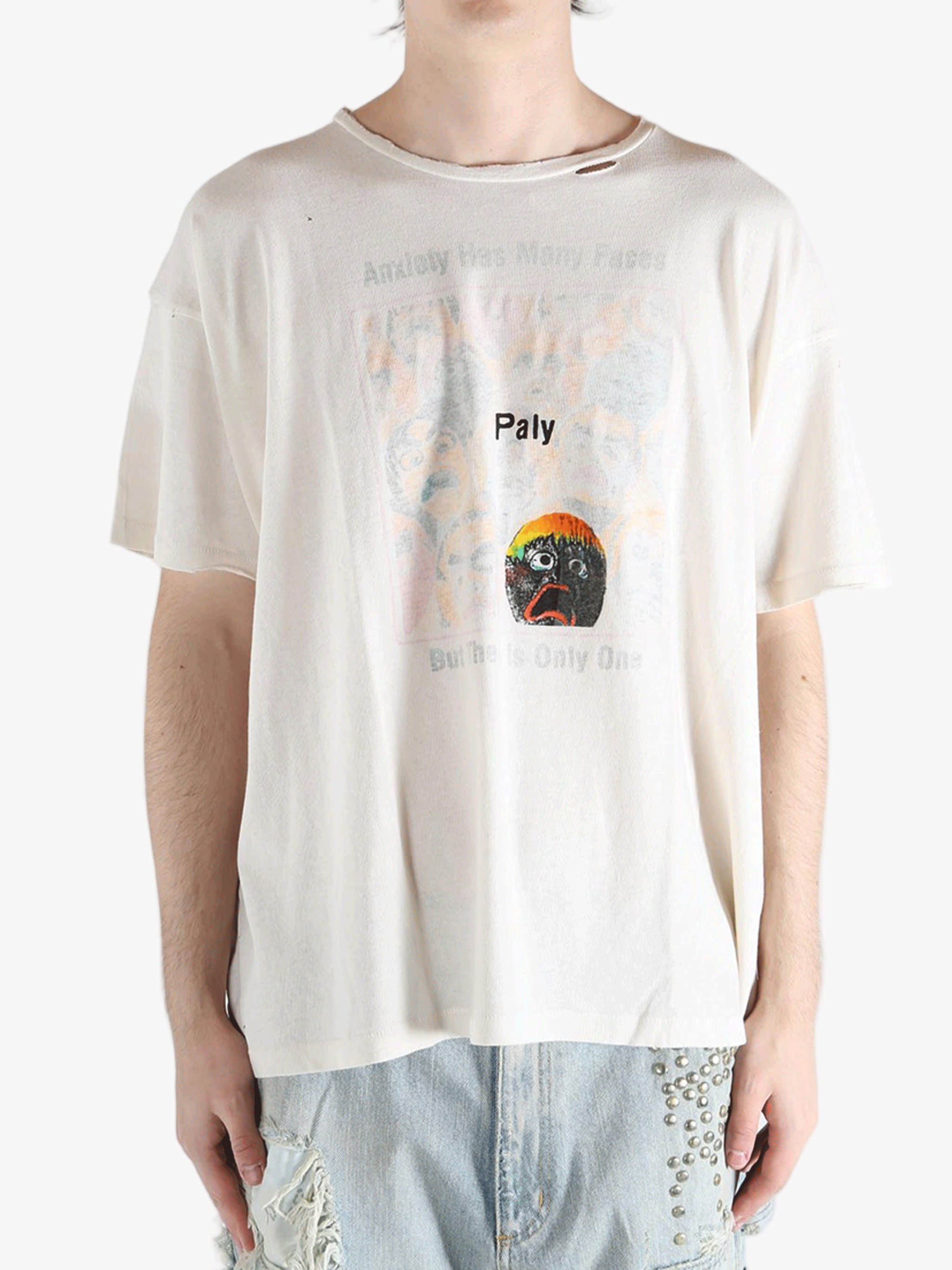 White t-shirt worn by a person, showing the shirt's fit