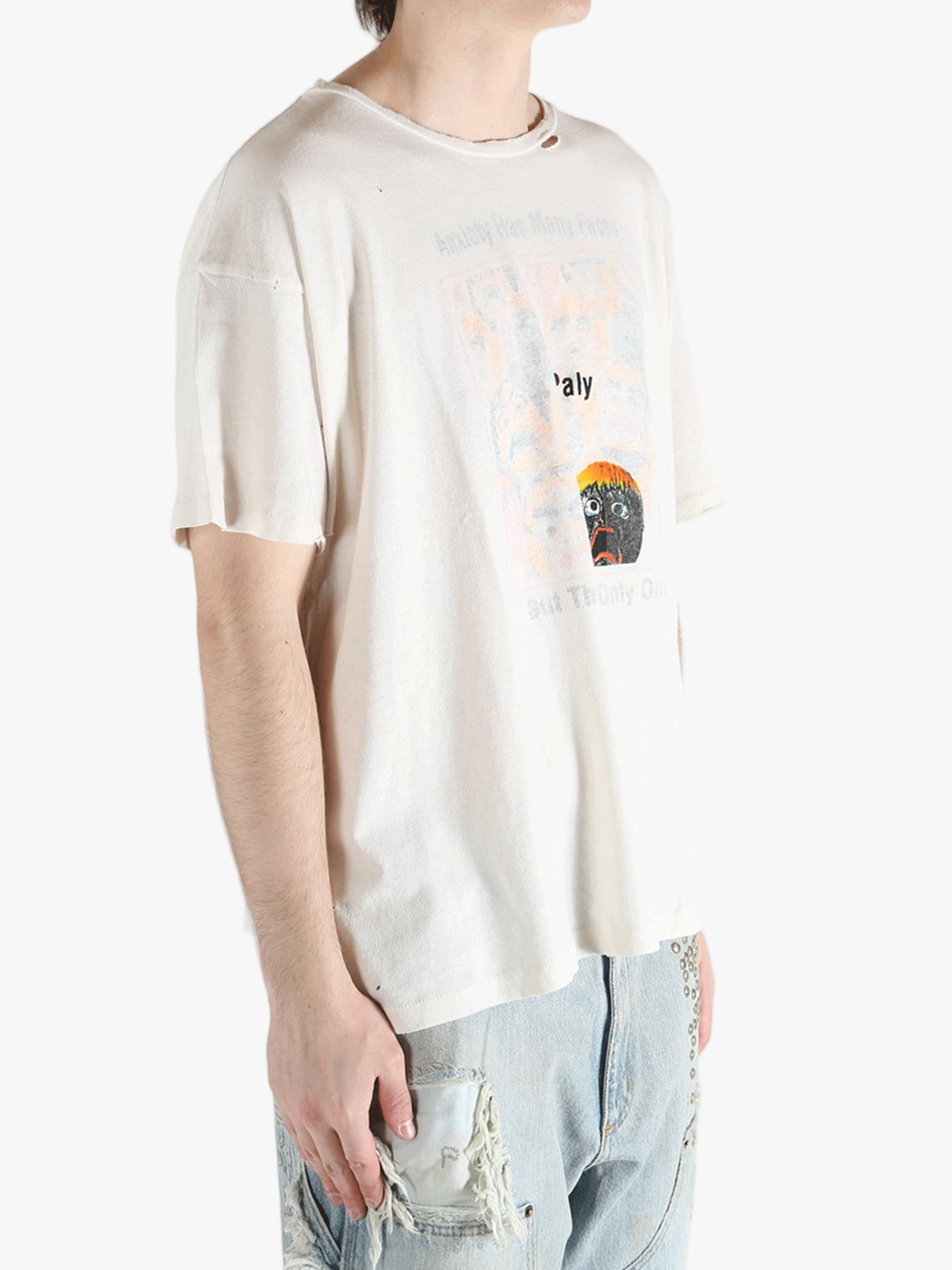 White t-shirt worn by a person, showing the shirt's fit