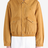 Tan jacket worn by a person, showing the jacket fit