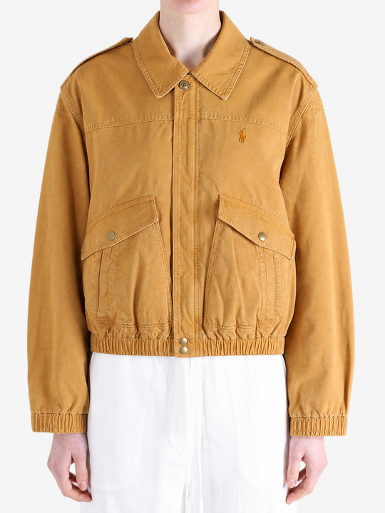 Tan jacket worn by a person, showing the jacket fit