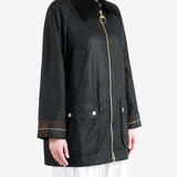 Black jacket worn by a person, showing the jacket fit