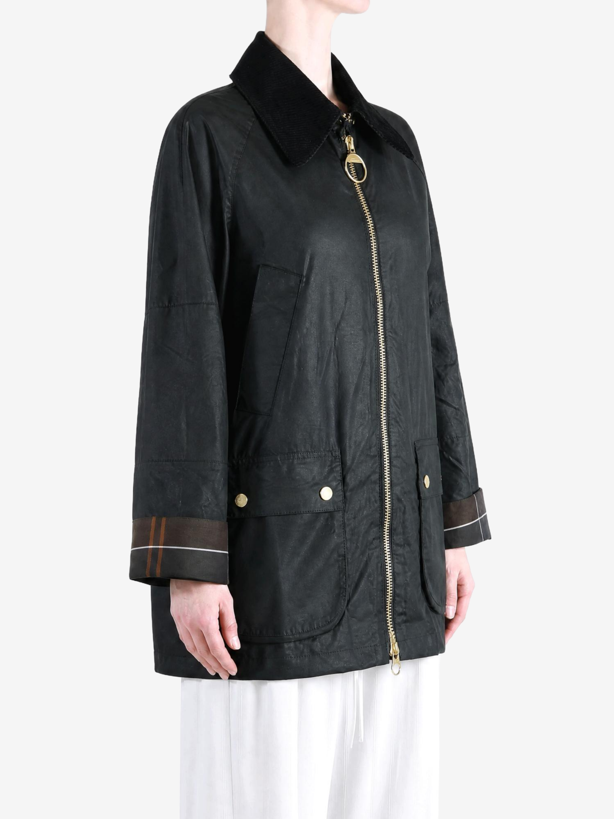 Black jacket worn by a person, showing the jacket fit