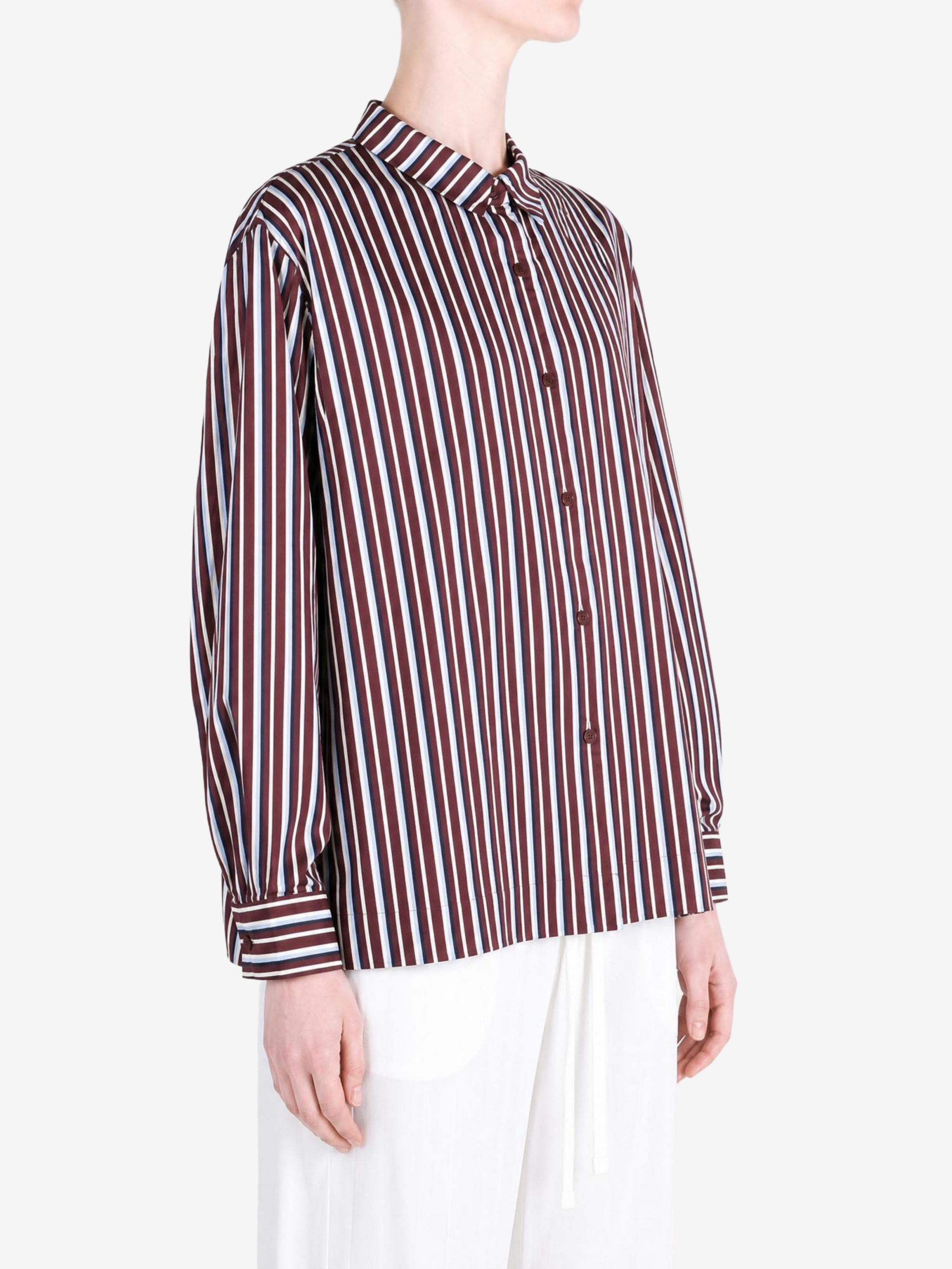 Burgundy shirt worn by a person, showing the shirt fit