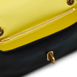 close up of black bags, showing texture of the leather fabric