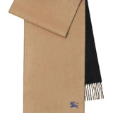 Close up of tan scarf, showing texture of the cashmere fabric