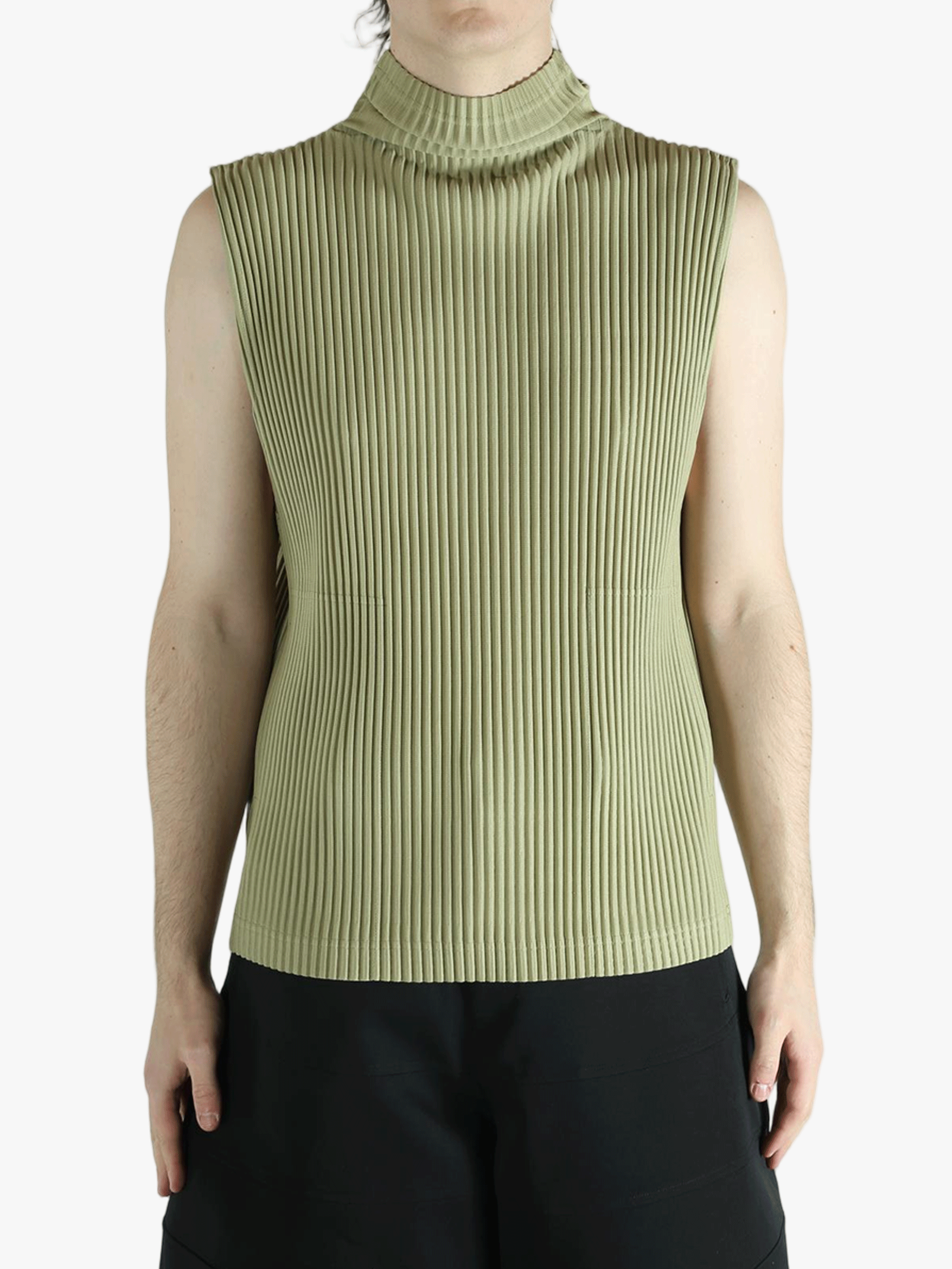 Green top worn by a person, showing the top's fit