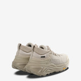 Tan sneakers,back view