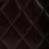 Close up of Brown bag, showing texture of the 100% calf leather made fabric