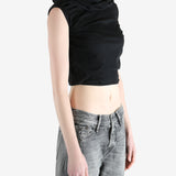 black sleeveless top worn by a person, showing the top fit