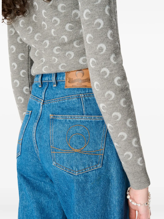 Close up of blue jeans, showing texture of the cotton fabric