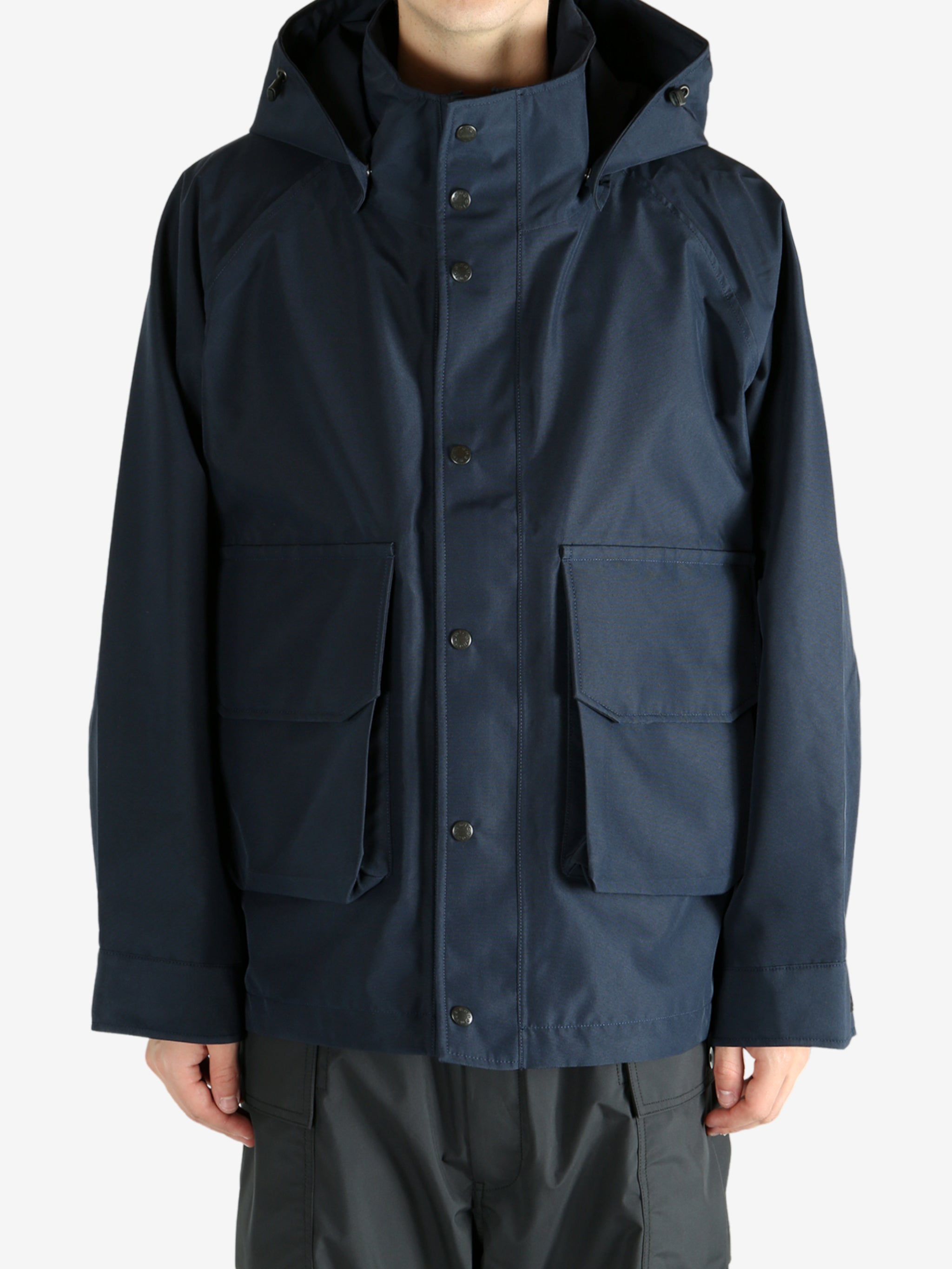 Navy jacket worn by a person, showing the jacket's fit