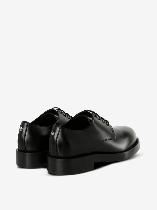 Black derby, back view