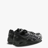 Black sneakers, back view