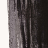 Close up of Black dress, showing texture of the 82% viscose/ 18% silk fabric
