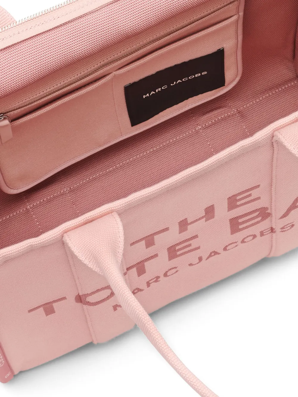 Close up of the pink bag, showing texture of the leather fabric