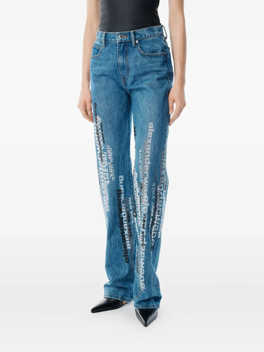 Blue jeans worn by a person, showing the jeans' fit