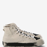 White sneaker, front view