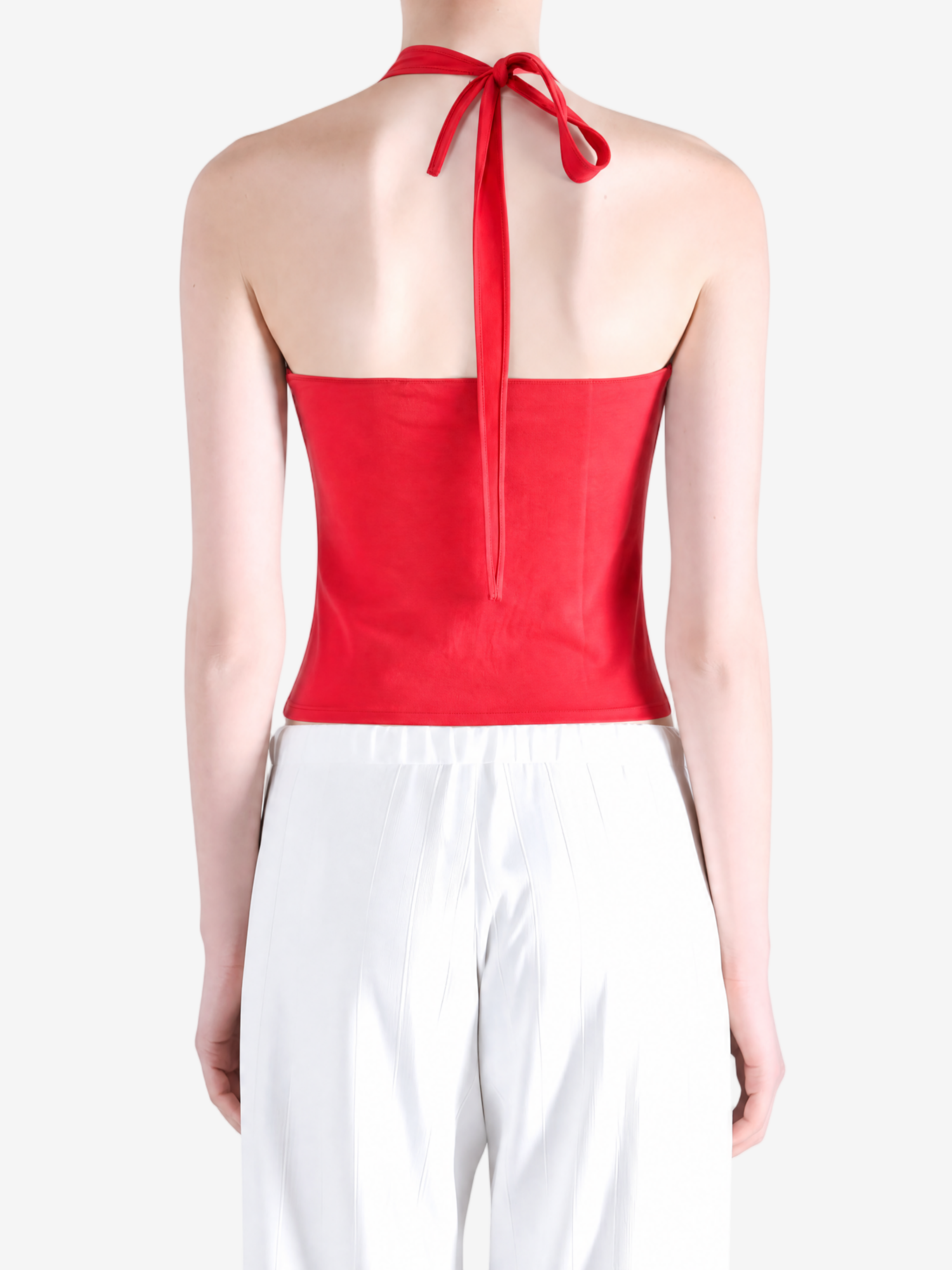 Red top worn by a person, showing the top fit