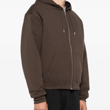 Brown jacket worn by a person, showing the jacket fit