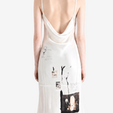 Tan dress worn by a person, showing the dress fit