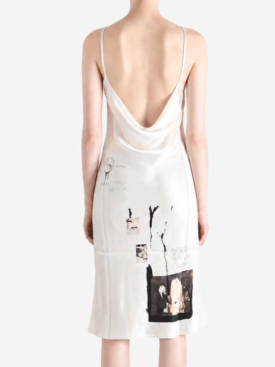 Tan dress worn by a person, showing the dress fit