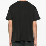 Black t-shirt worn by a person, showing the t-shirt's fit