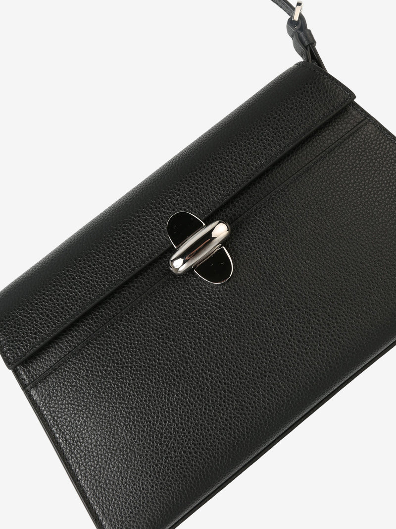 Close up of black bag, showing texture of the calfskin fabric