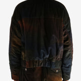 Black jacket worn by a person, showing the jacket's fit