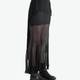 Black skirt worn by a person, showing the skirt's fit