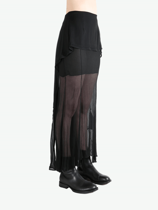Black skirt worn by a person, showing the skirt's fit