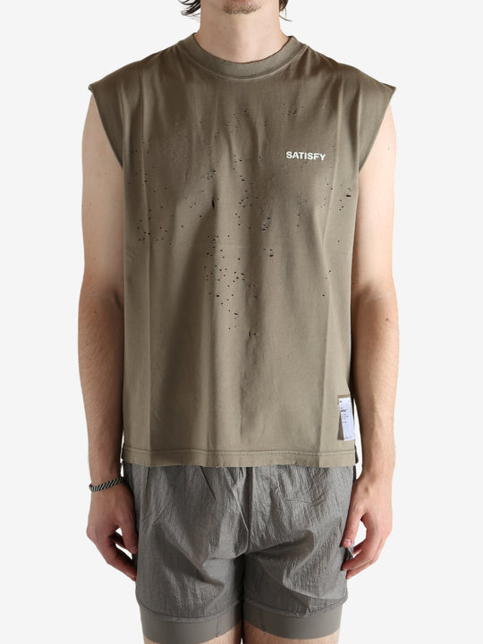 Brown shirt worn by a person, showing the shirt fit