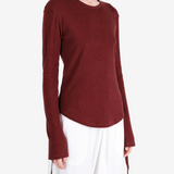 Burgundy top worn by a person, showing the top fit