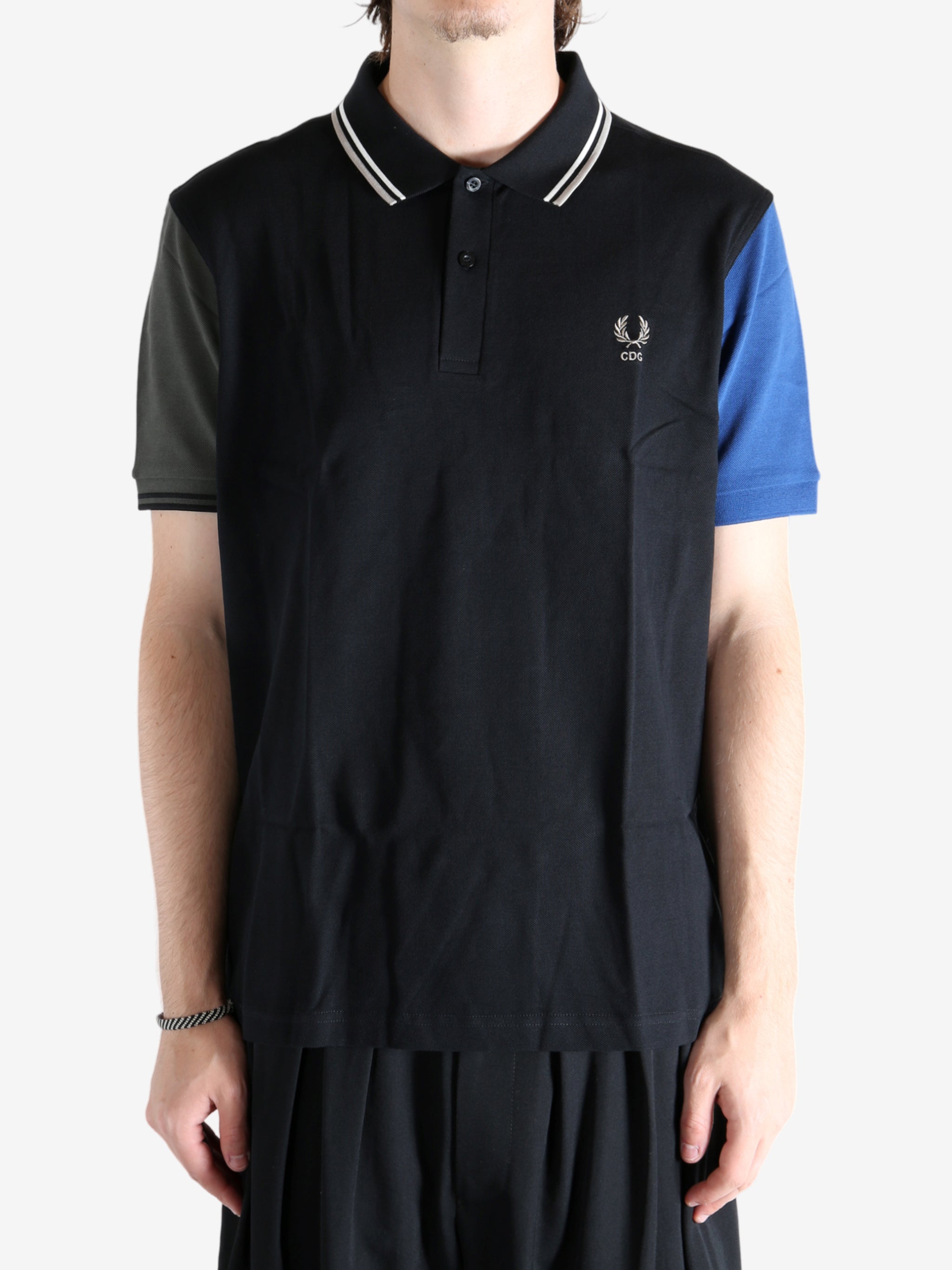 Black T-shirt worn by a person, showing the T-shirt's fit