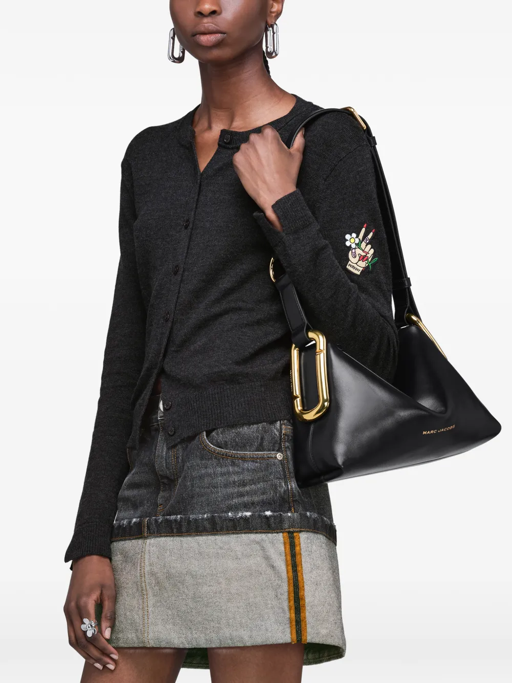 Black bag worn by a person, showing the bag fit