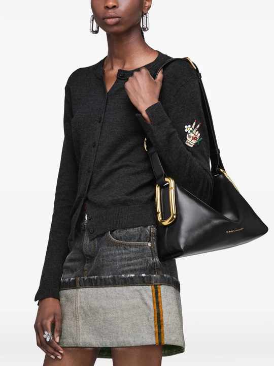 Black bag worn by a person, showing the bag fit