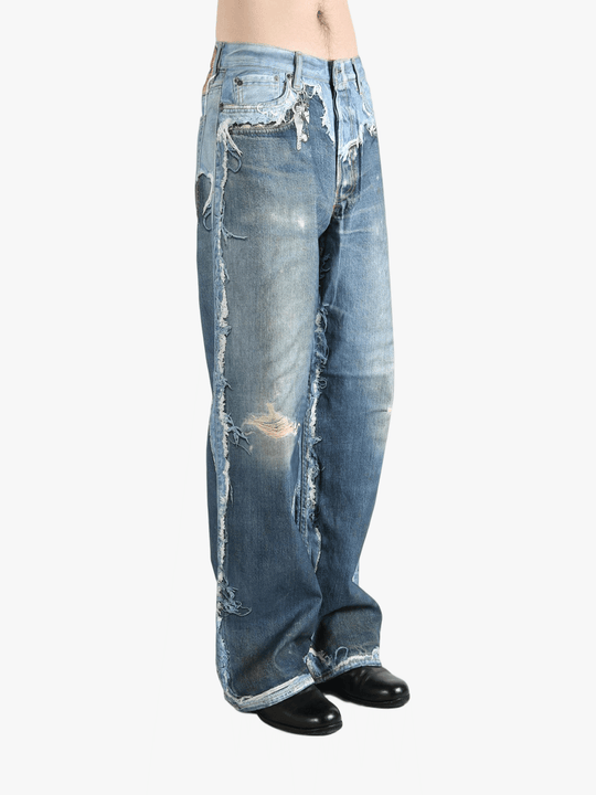 Blue jeans worn by a person, showing the jeans fit
