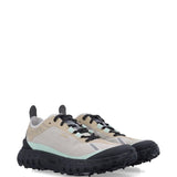 Tan sneakers, side view