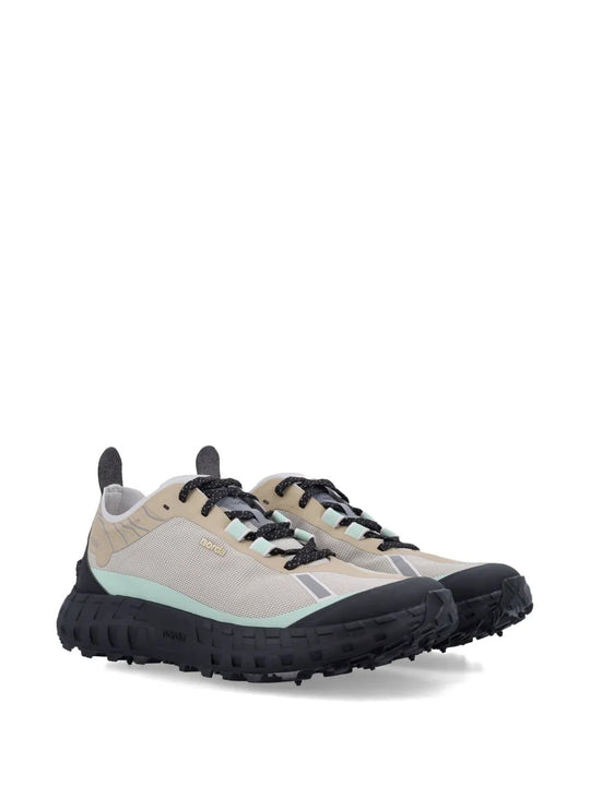 Tan sneakers, side view