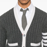 Close up of grey knitwear, showing texture of the cashmere fabric