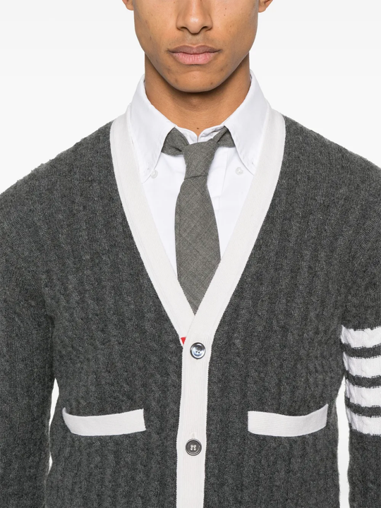 Close up of grey knitwear, showing texture of the cashmere fabric